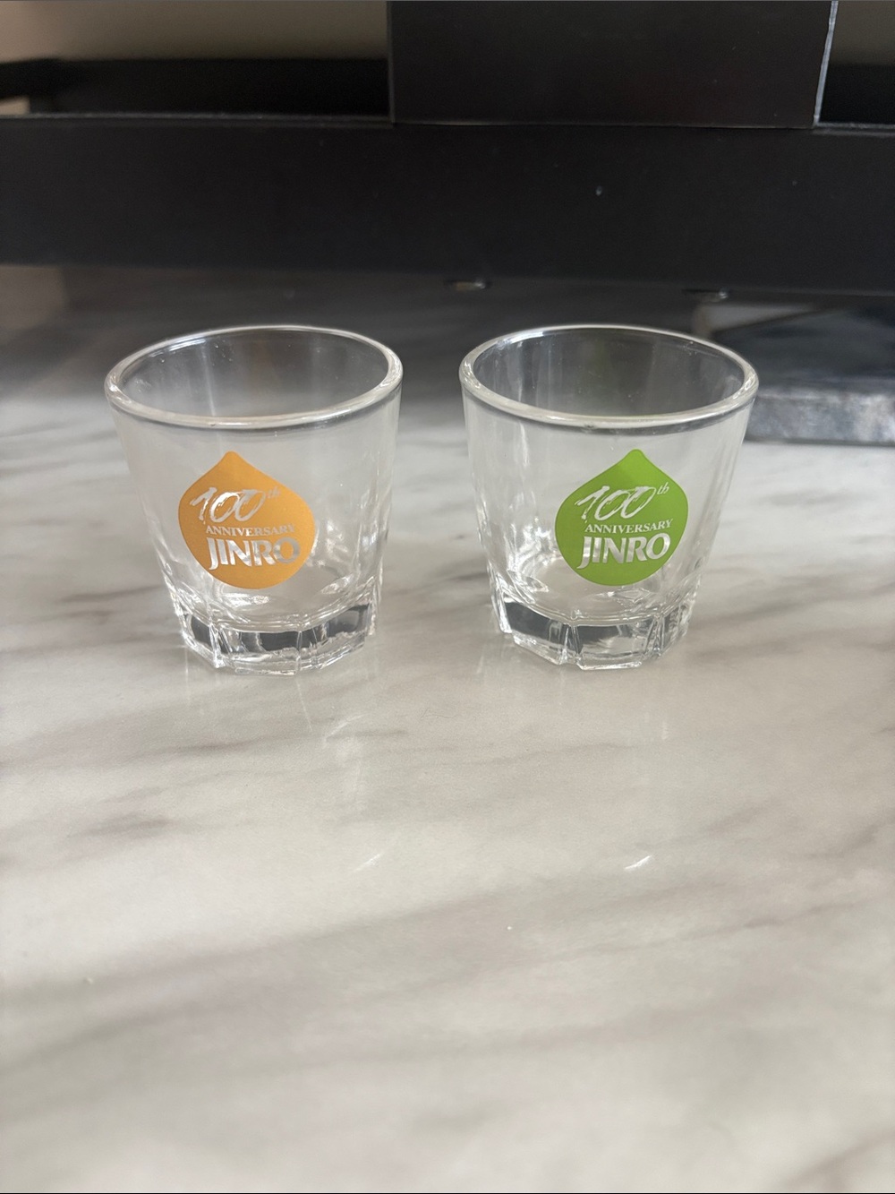 Jinro 100th Anniversary Shot Glasses - Orange & Green - Set of 2